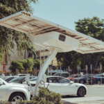 Modern solar-powered charging station for electric vehicles on a sunny day.
