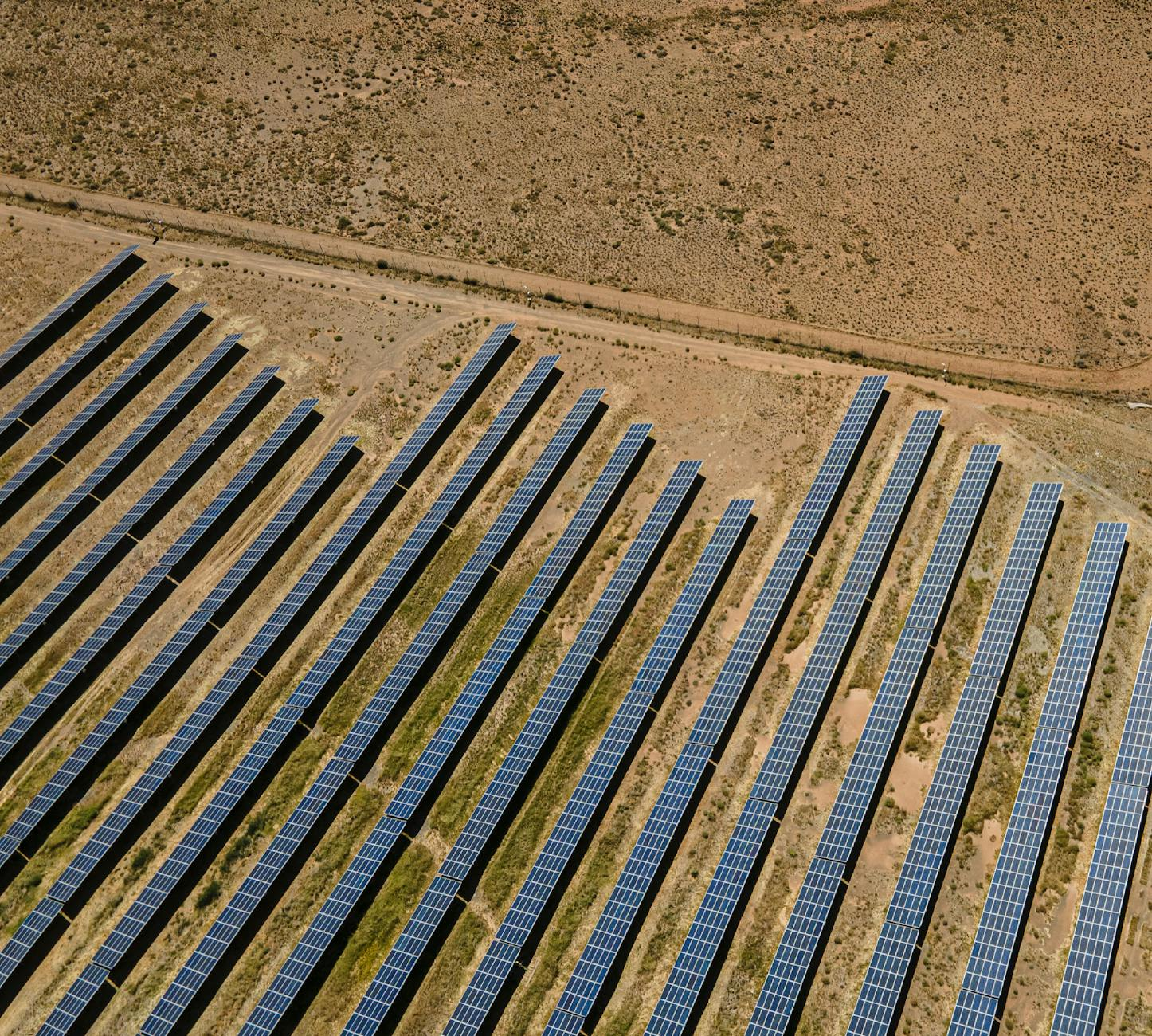 Aerial shot of solar panels in De Aar, illustrating sustainable energy in South Africa.