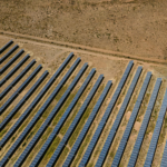 Aerial shot of solar panels in De Aar, illustrating sustainable energy in South Africa.