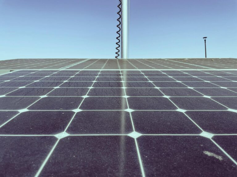 Detailed view of solar panels capturing sunlight, showcasing renewable energy technology.