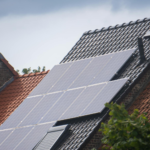 Solar panels installed on a residential rooftop, showcasing eco-friendly renewable energy solutions.