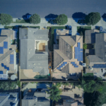 Top-down view of urban houses with solar panels emphasizing clean energy solutions.