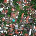 Aerial view of homes and greenery in Serpong, Indonesia, showcasing urban architecture.
