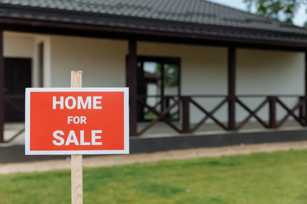 Couple reviewing paperwork while buying a house in the Florida Panhandle