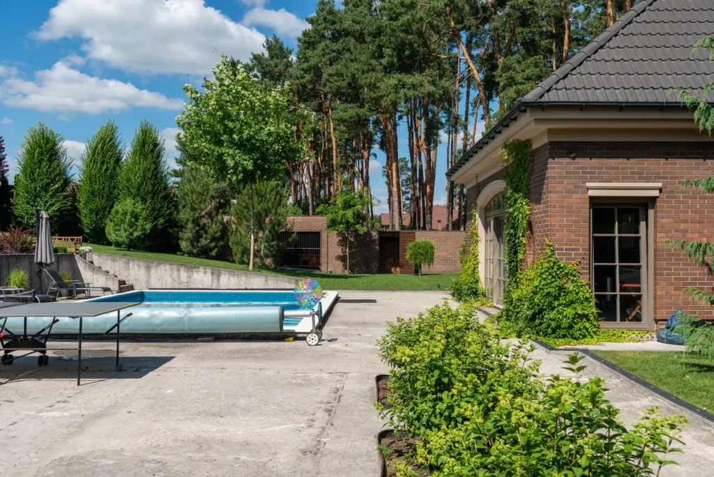 Suburban house with a private swimming pool and garden